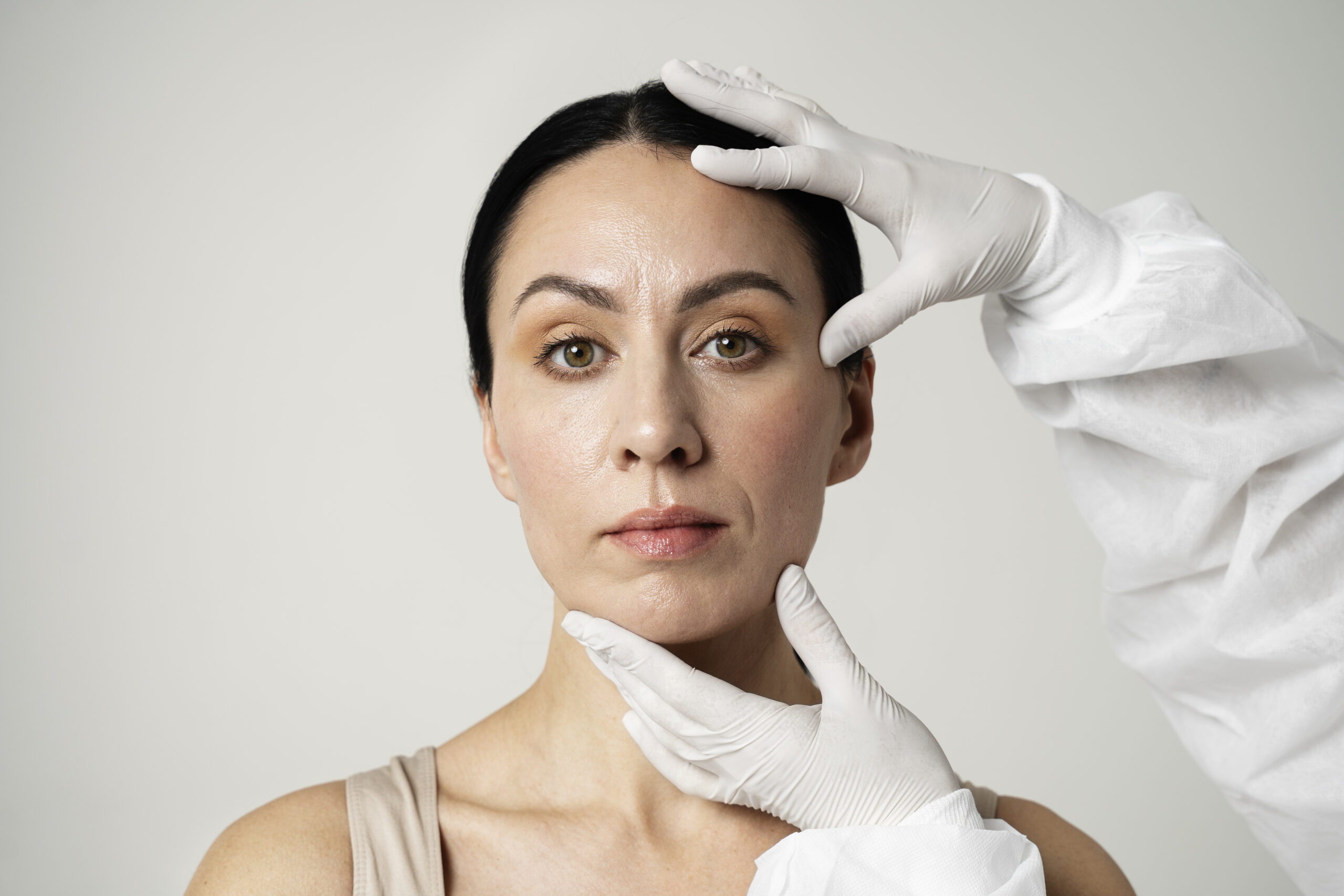 front-view-hands-holding-woman-s-head