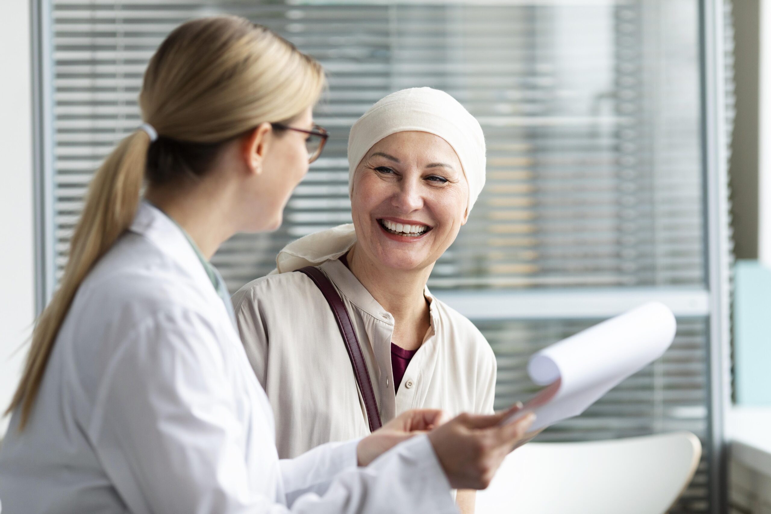 middle-aged-woman-with-skin-cancer-talking-with-her-doctor