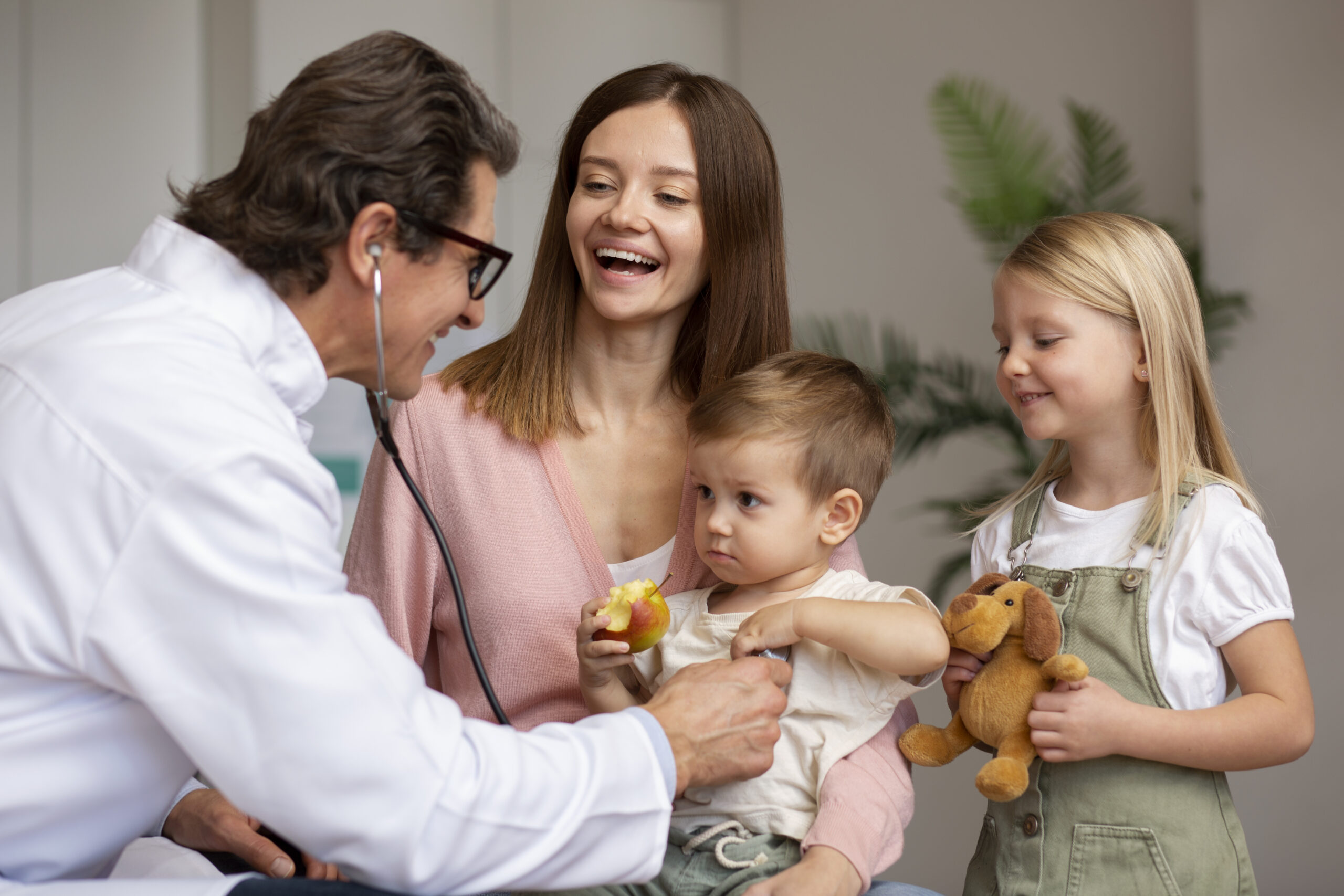 young-mother-with-her-children-pediatrician-appointment